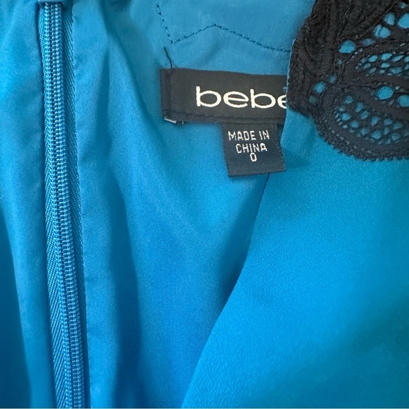 Bebe women's size small blue with black lace v-neck romper - Picture 4 of 4